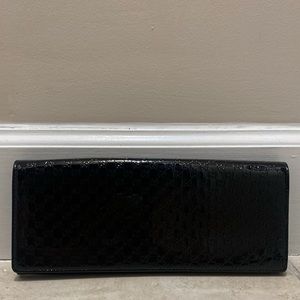 Gucci Black Microguccissima patent leather Clutch